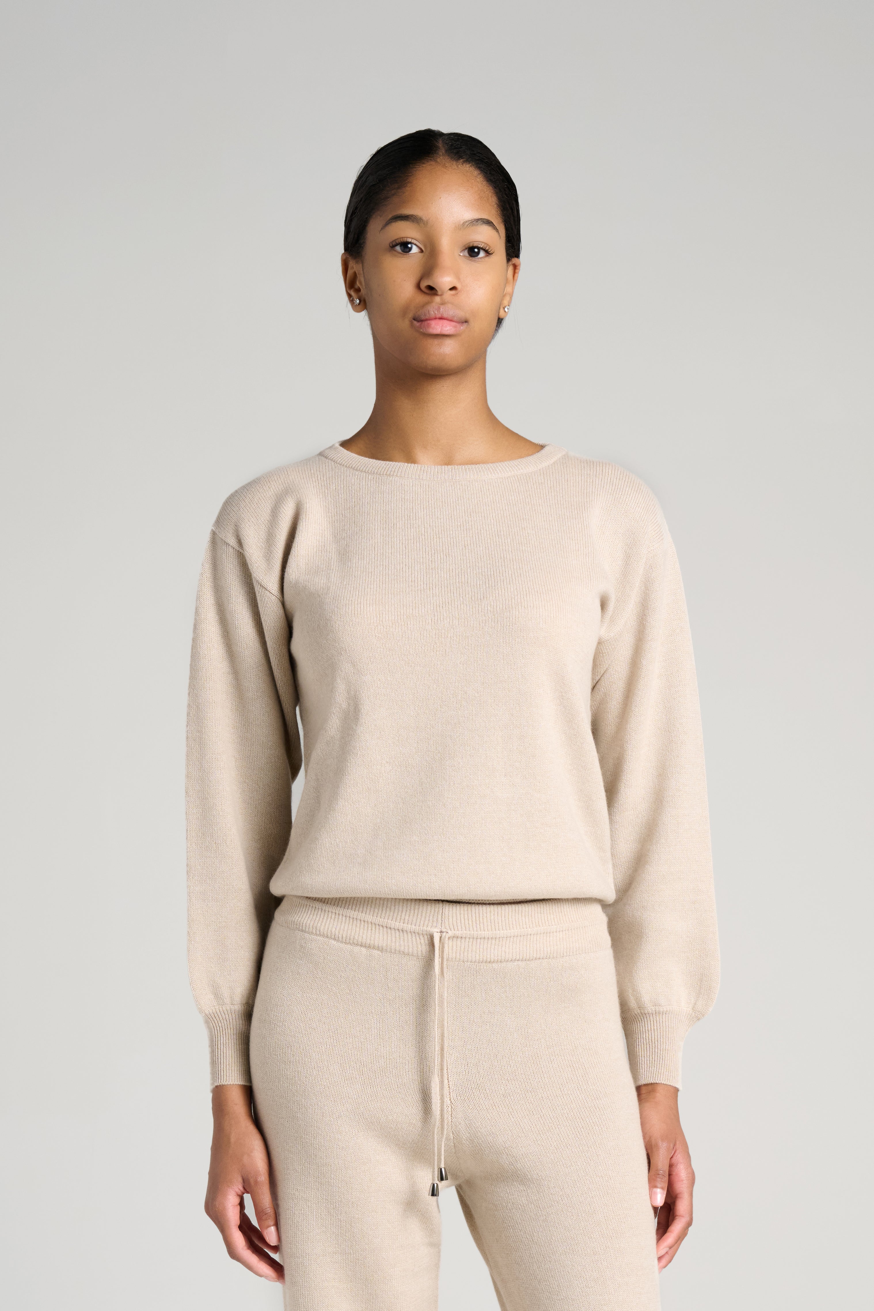 Close-up of oatmeal Verona Sweater. Subtly heathered texture in soft Cariaggi cashmere.